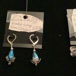 Silver plated ear wire and bead caps and a glass.These are 1 & 1/2”price $15.